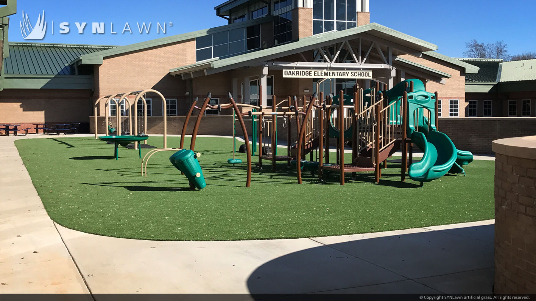 Artificial lawn install elementary school playground
