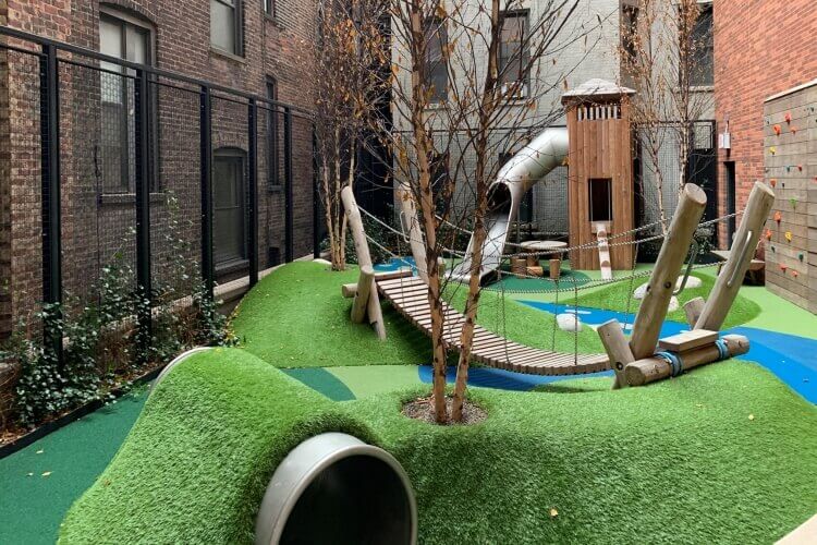 Artificial grass playground on new york rooftop 