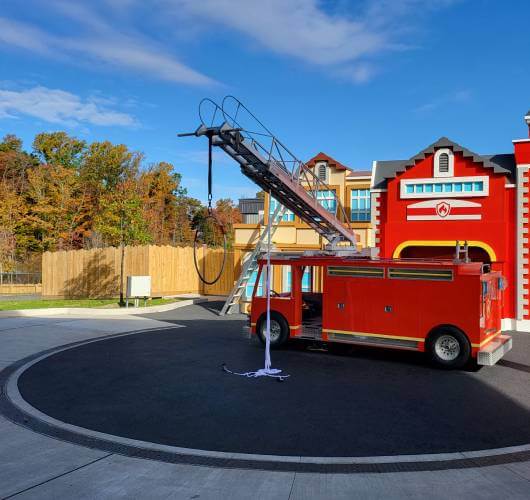 Artificial gras playground with firetruck
